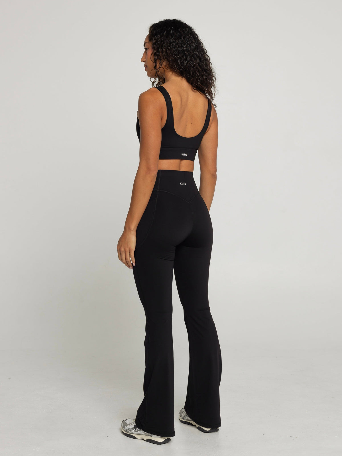 UNIFORM POCKET FLARE LEGGINGS - BLACK
