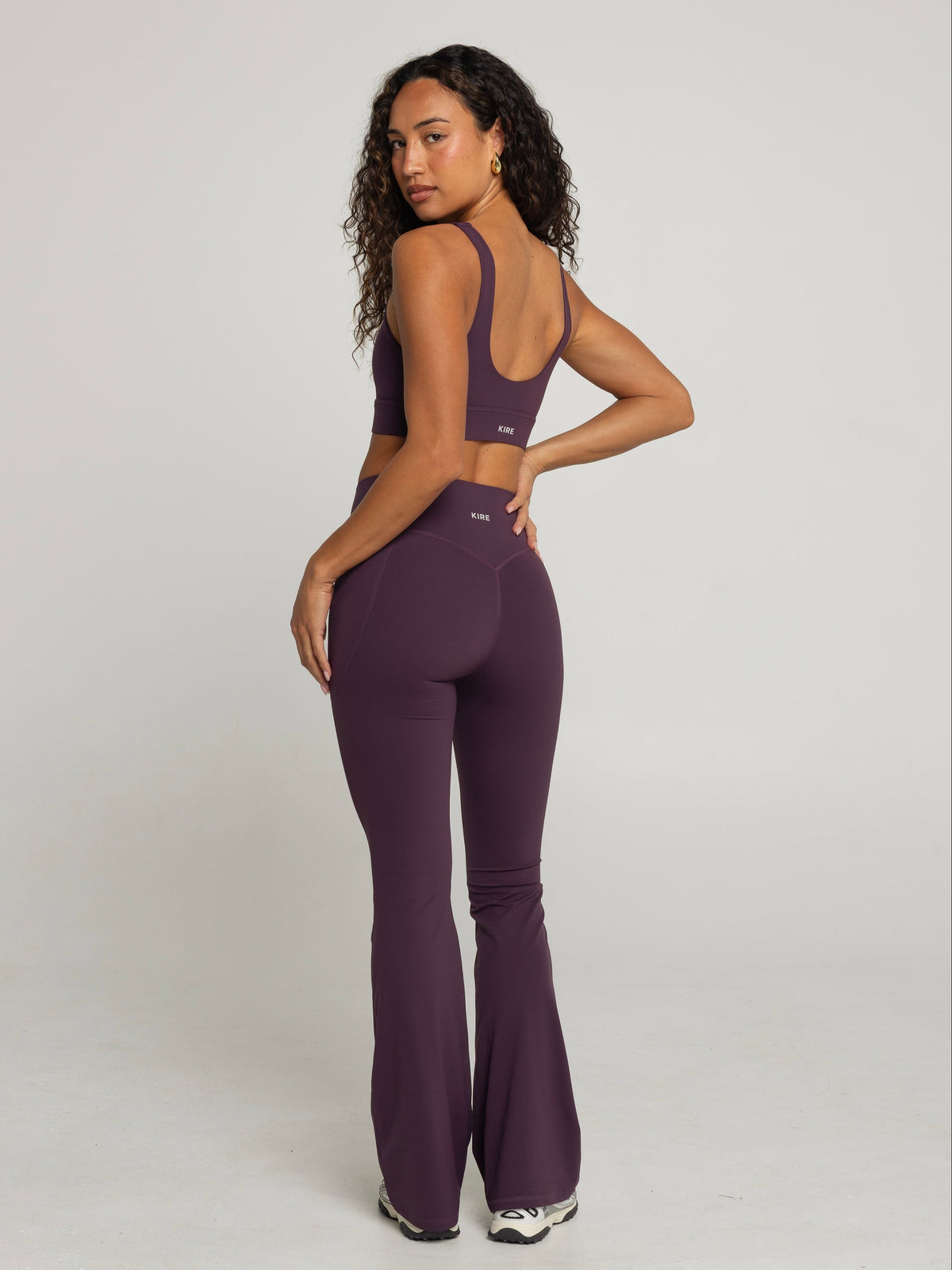 UNIFORM POCKET FLARE LEGGINGS - PLUM