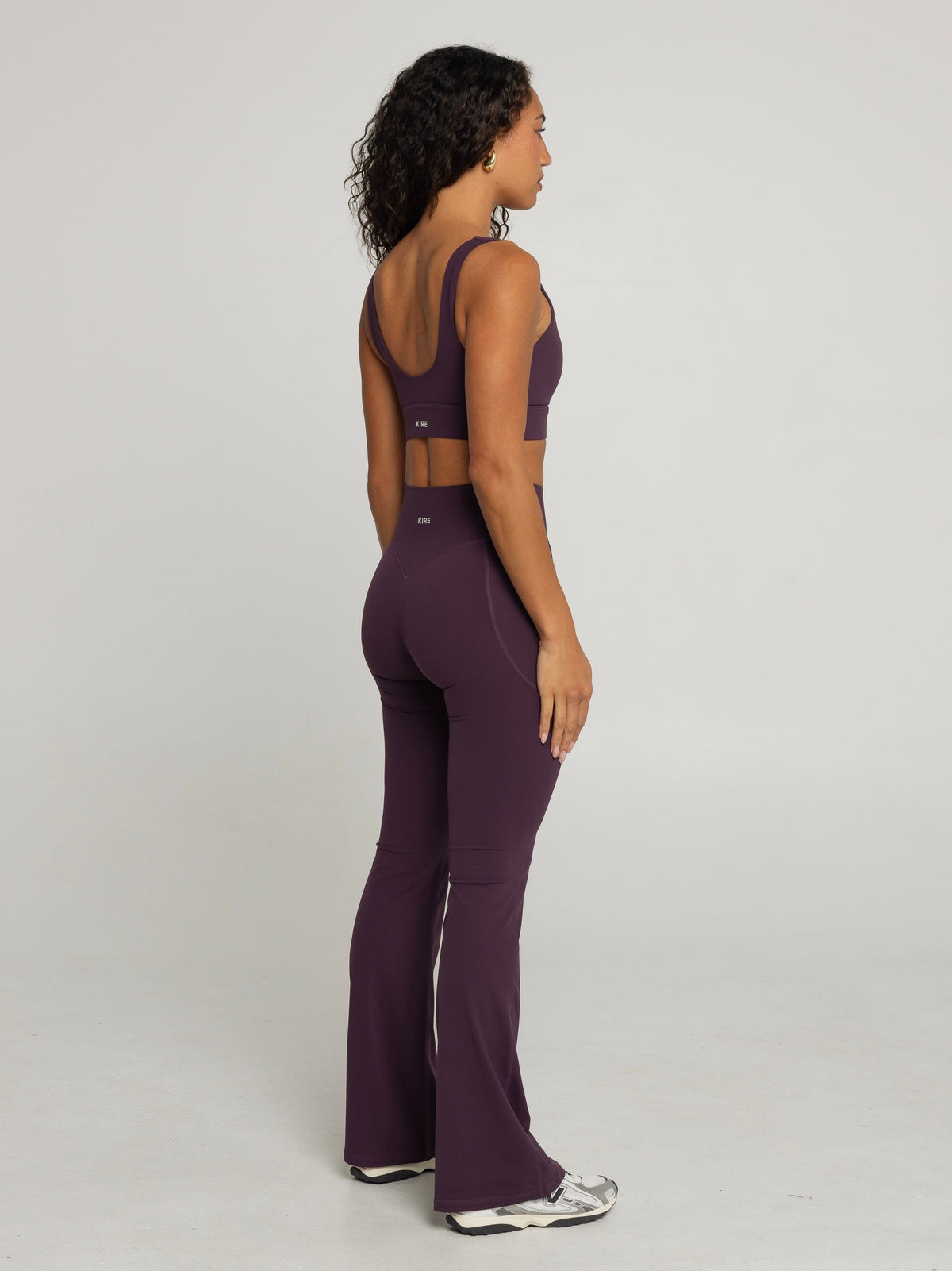 UNIFORM POCKET FLARE LEGGINGS - PLUM